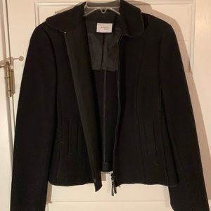 Black zip up jacket.